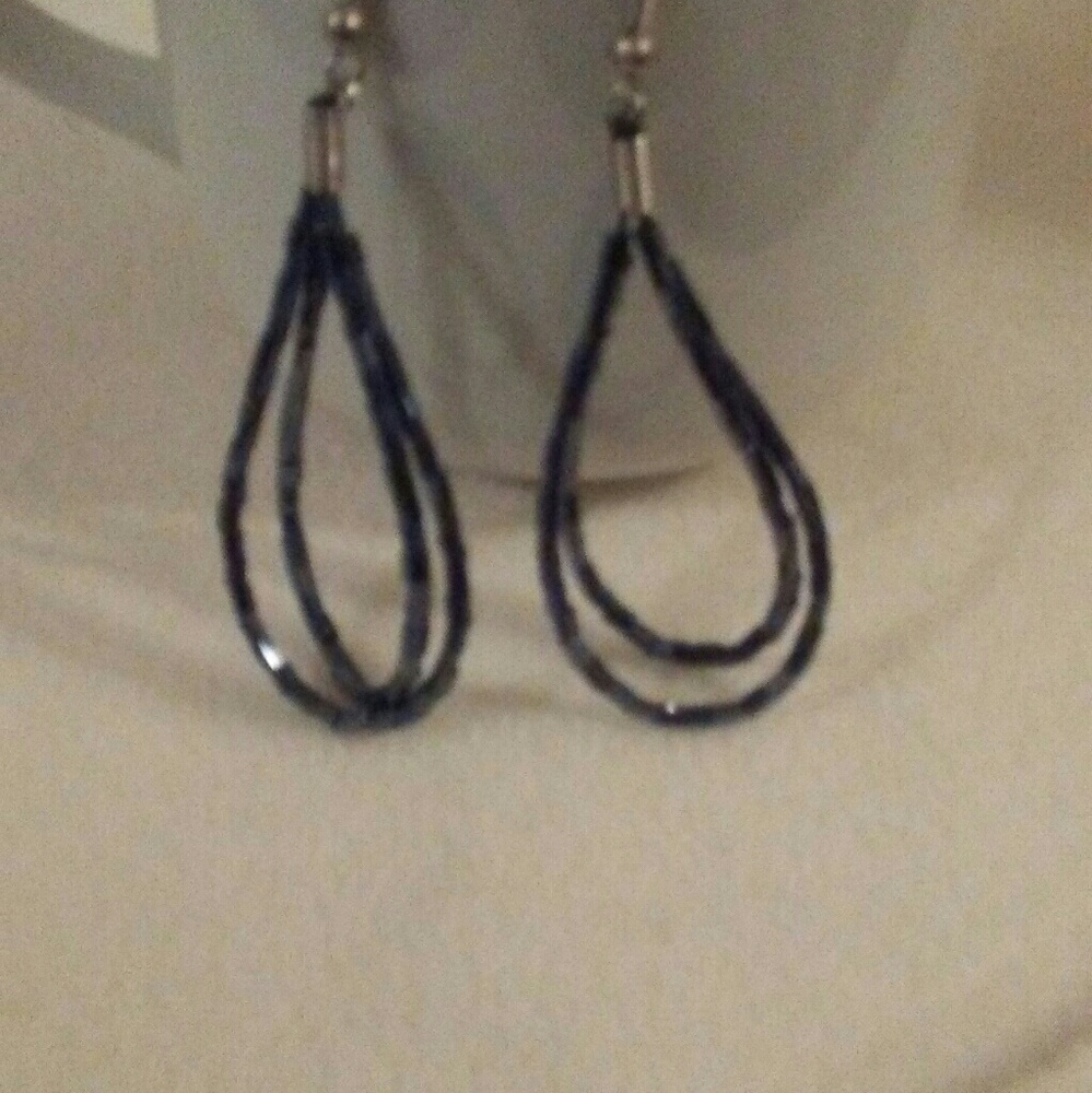 Various unique earrings...
